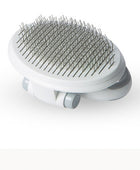 Self-cleaning wire brush for pets